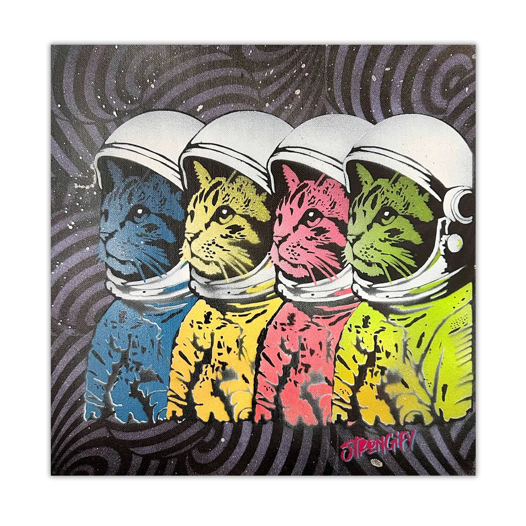 Four cats wearing astronaut helmets in blue, yellow, pink, and green on a dark space-themed background.