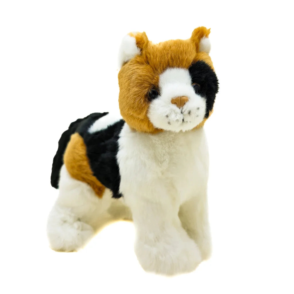 Plush toy resembling a calico cat on a white background